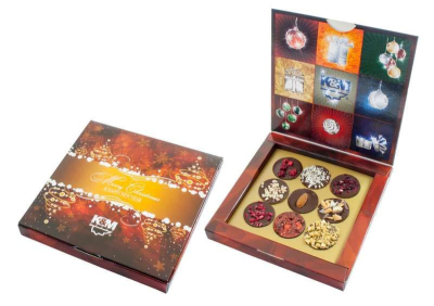 fotografia Firmowe cukierki w opakowaniach metalowych